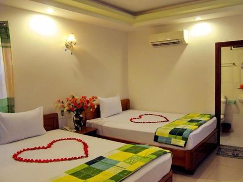 Phòng 2 Giường Đơn - Khách sạn Nắng Biển - Sunny Sea