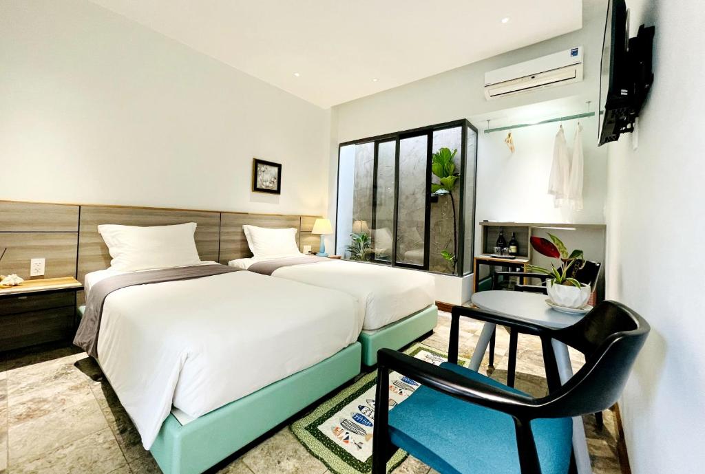 Phòng 2 Giường Đơn Với Phòng Tắm Riêng - Côn Đảo House