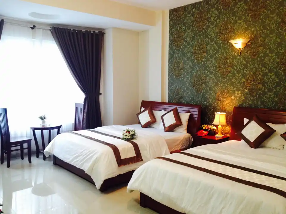 Deluxe Quadruple - Khách sạn Queen Garden