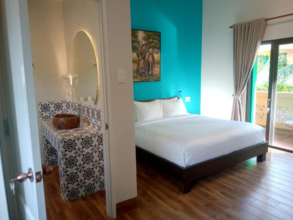 Phòng Deluxe Giường Đôi Với Sân Hiên - Tầng Thượng - MiNhon Hotel Muine