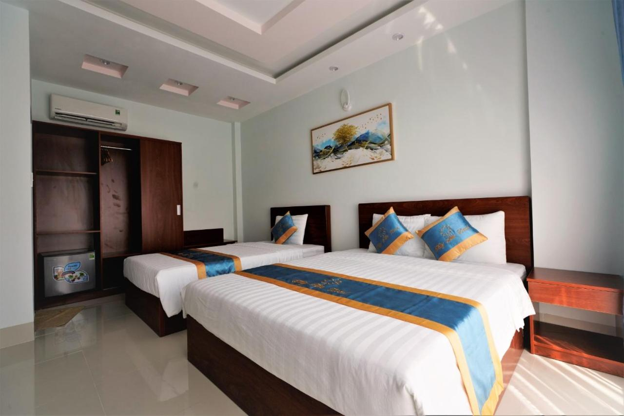 Phòng 1 giường đôi 1 giường đơn - Thuỷ Tiên Hotel Côn Đảo