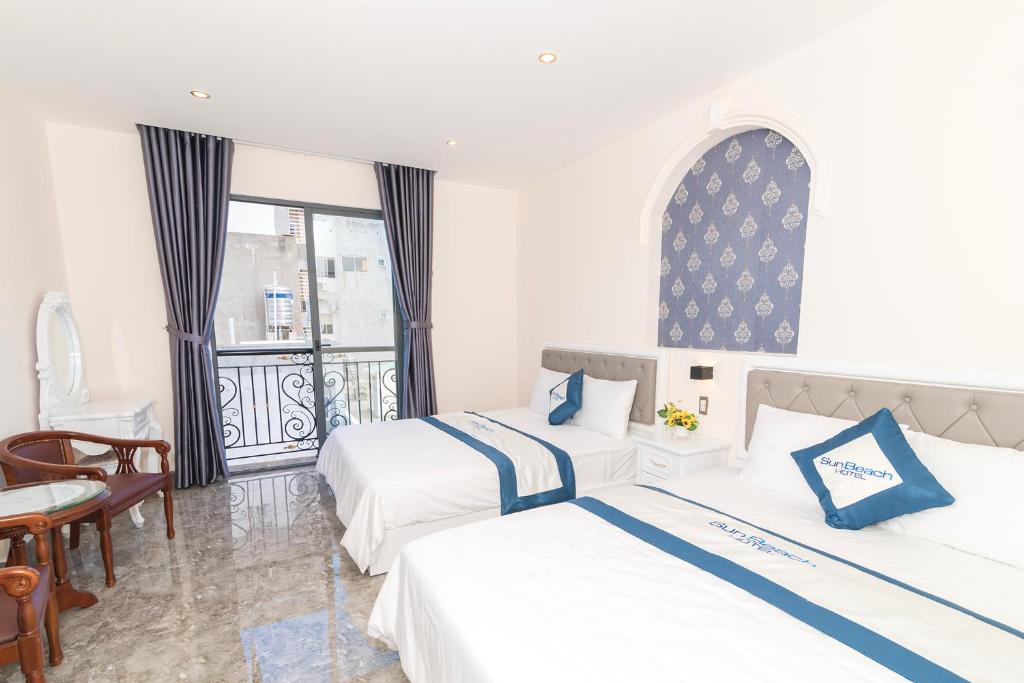 Phòng Deluxe 2 giường đơn với ban công - Sun Beach Hotel