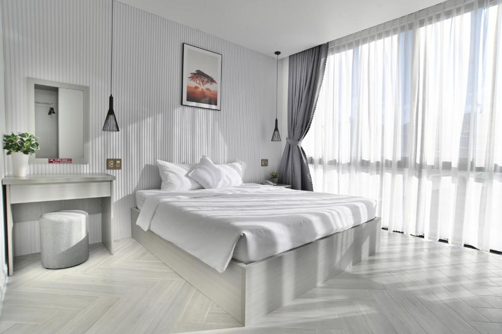 Phòng Deluxe Giường Đôi - Tuấn Ninh Hotel 2