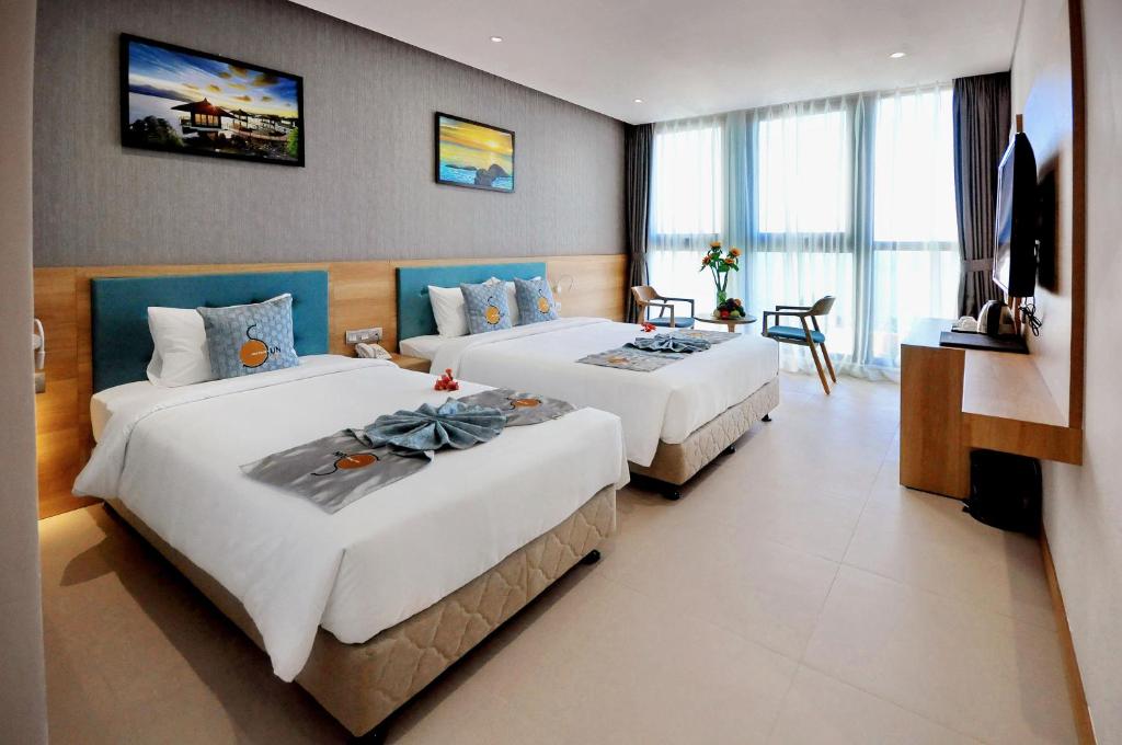 Phòng Deluxe 2 Giường Đơn - Sun Kiss Hotel