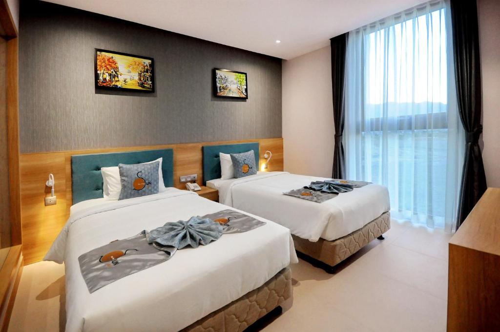 Phòng Tiêu Chuẩn 2 Giường Đơn - Sun Kiss Hotel