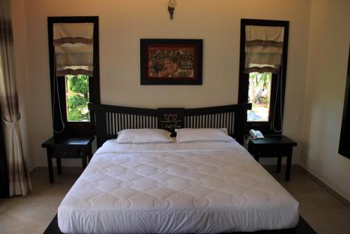 Phòng Tiêu Chuẩn Nhìn Ra Vườn - Lotus Village Resort