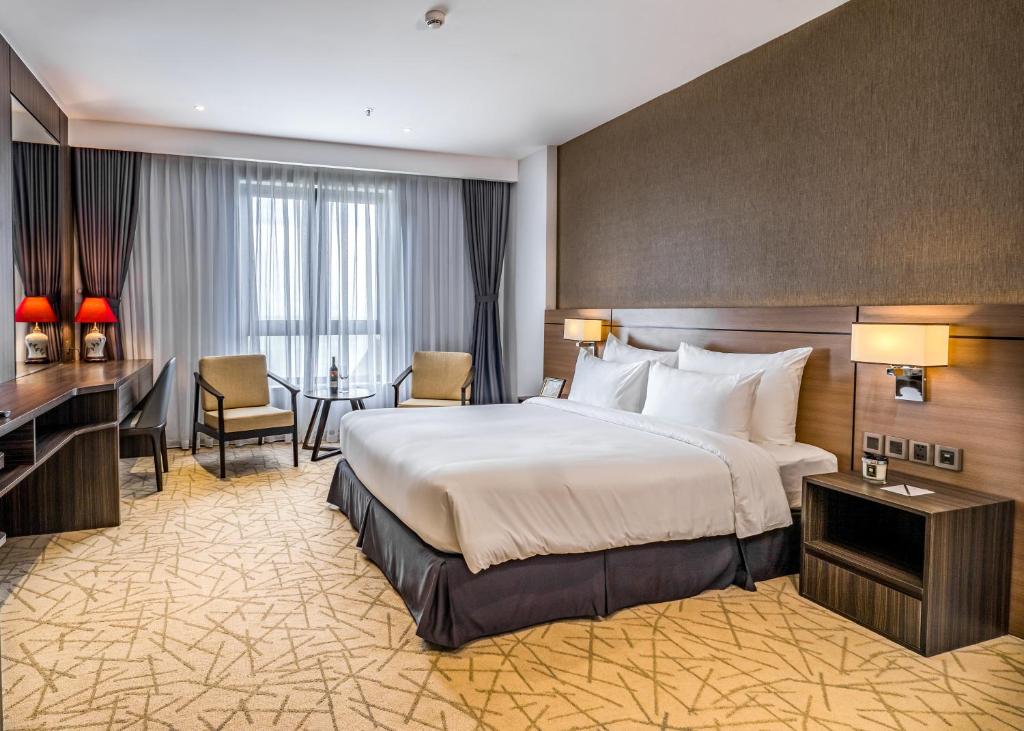 Phòng Tiêu Chuẩn Giường Đôi - The Cap Hotel