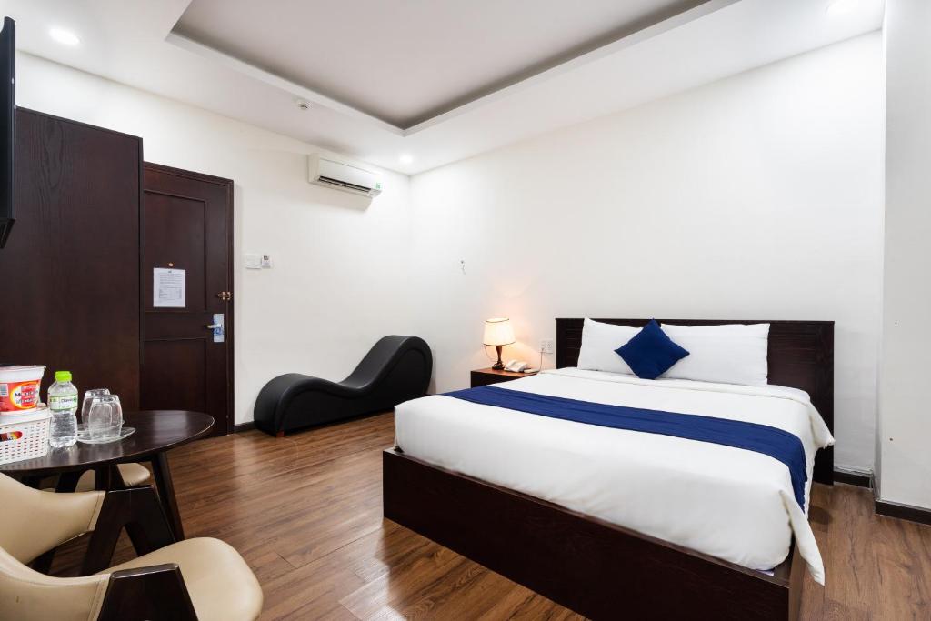 Phòng Deluxe Giường Đôi - Joi Central Hotel