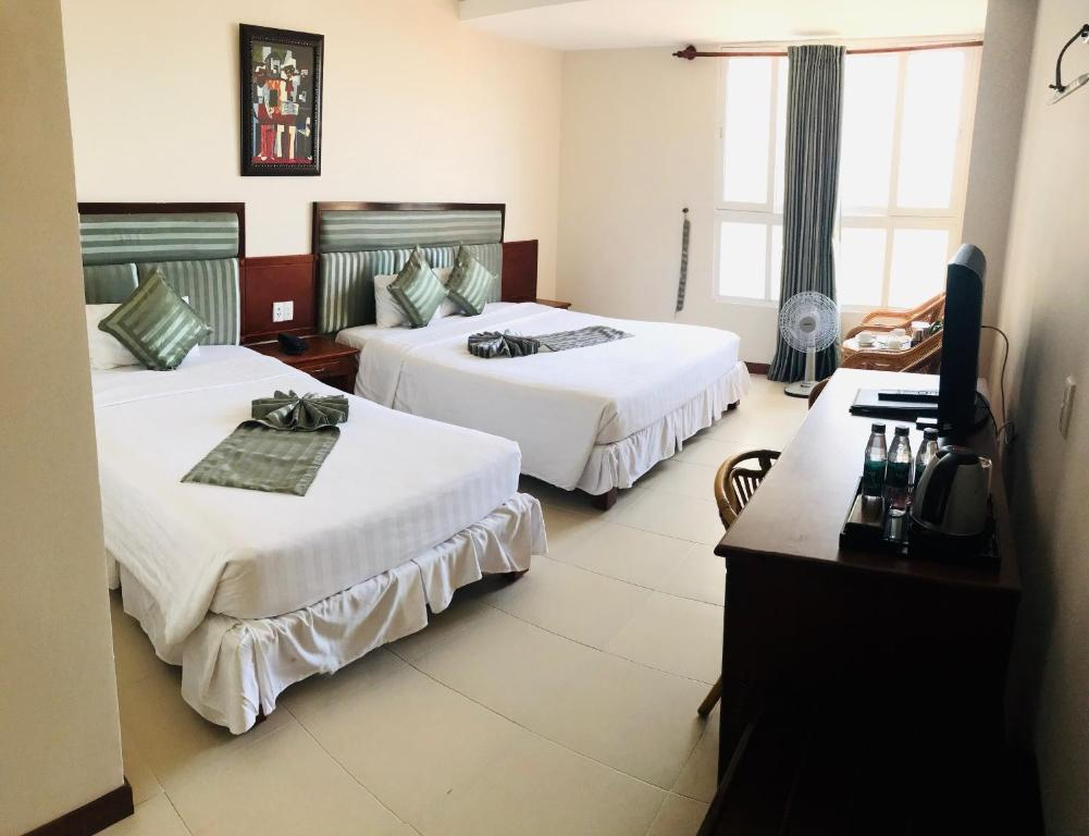 Phòng Deluxe cho 3 Người - Khách sạn The Coast