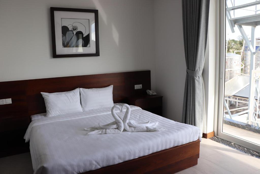 Phòng Deluxe Giường Đôi - Khách sạn Qli