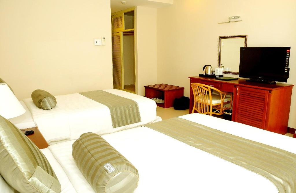 Phòng Giường Đôi/2 Giường Đơn Nhìn Ra Góc Biển - Khách sạn The Coast