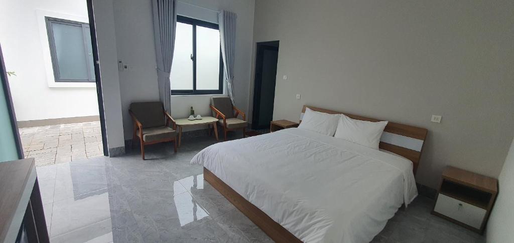 Phòng Deluxe Có Giường Cỡ Queen - P'House Hotel